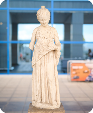small statue at athens international airport